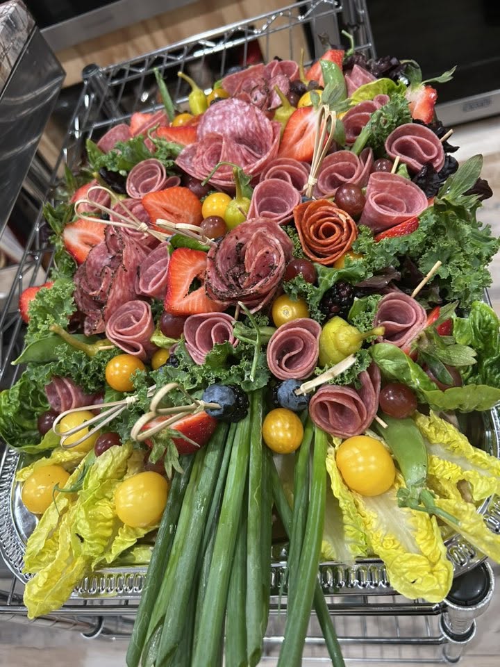 Catori Artisan Large Charcuterie Grazing Board - CATORI Artisan Charcuterie bouquet on a silver tray: rolled salami, strawberries, grapes, yellow tomatoes, and leafy greens arranged like a centerpiece.